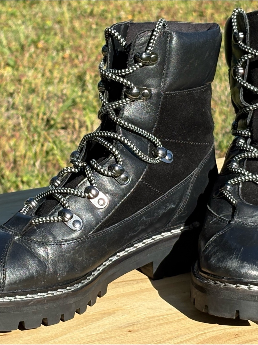 Black Women's Combat Moto Boots with Lug Sole and Lace-Up Hardware
